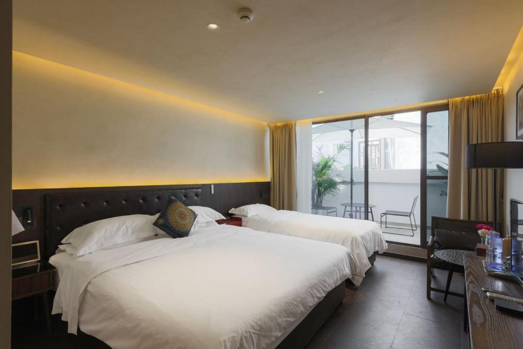 Qintai Tibetan Culture Boutique Hotel Чэнду Экстерьер фото