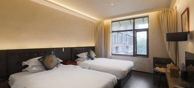 Qintai Tibetan Culture Boutique Hotel Чэнду Экстерьер фото