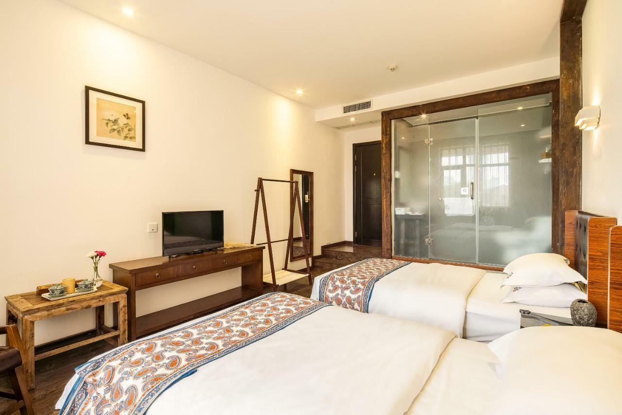 Qintai Tibetan Culture Boutique Hotel Чэнду Экстерьер фото