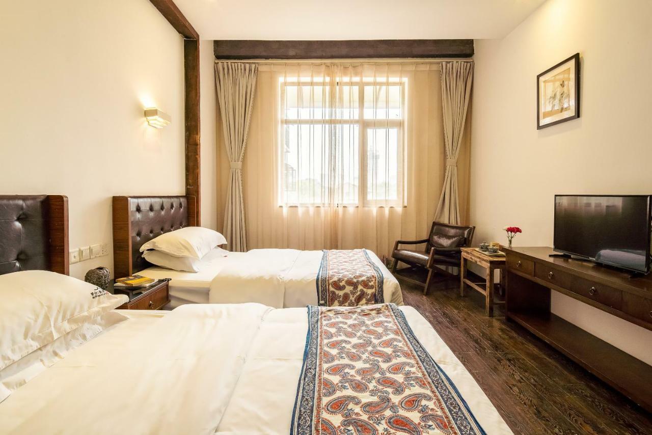 Qintai Tibetan Culture Boutique Hotel Чэнду Экстерьер фото