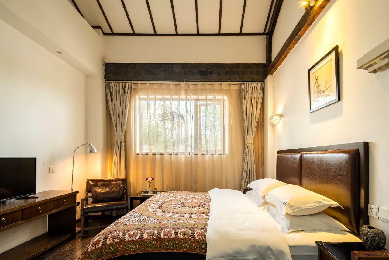 Qintai Tibetan Culture Boutique Hotel Чэнду Экстерьер фото